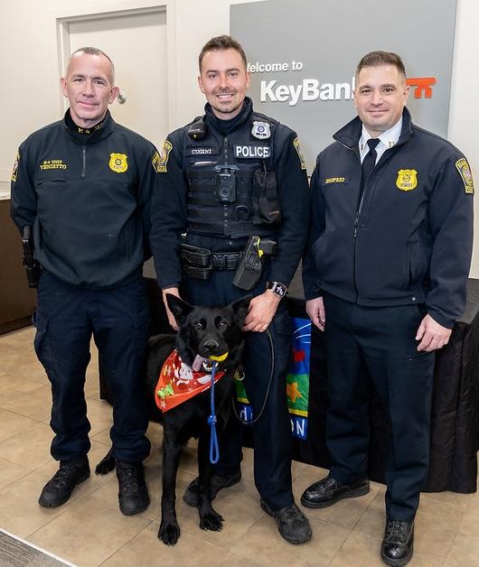 Hamden Police Officers shown with K-9 Jet.